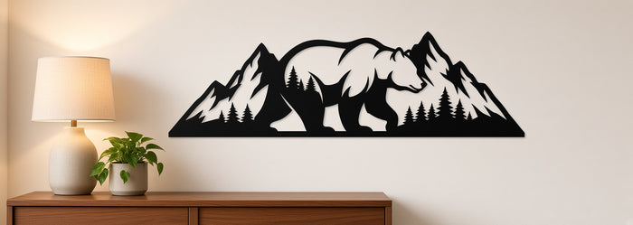 Bear mountain metal wall art shown in matte black on a living room wall above a wooden console