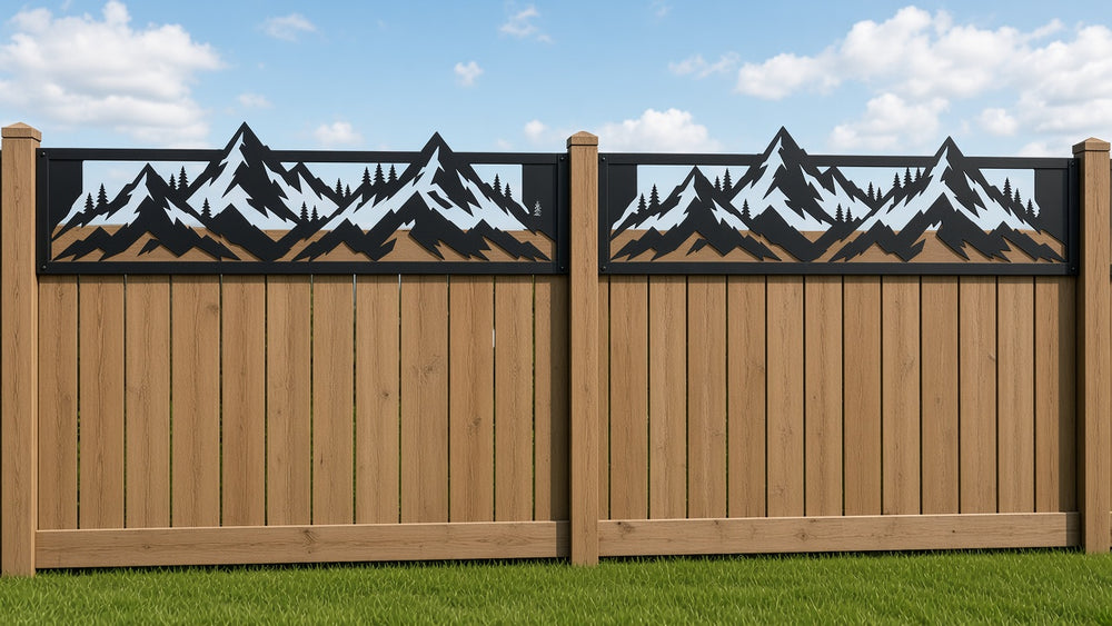 Mountain range metal fence topper on wood privacy fence